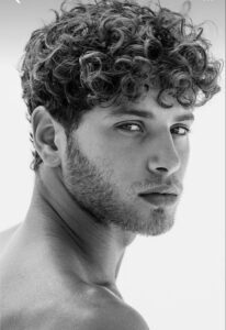 Men’s perm hair treatment at GQ Men’s Hair Lounge, a leading barbershop in Dubai.